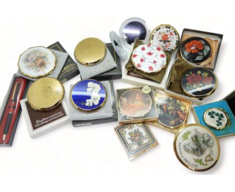 Eight Stratton powder compacts in unused condition most with pouches and original boxes, further compact mirrors, an Irish th