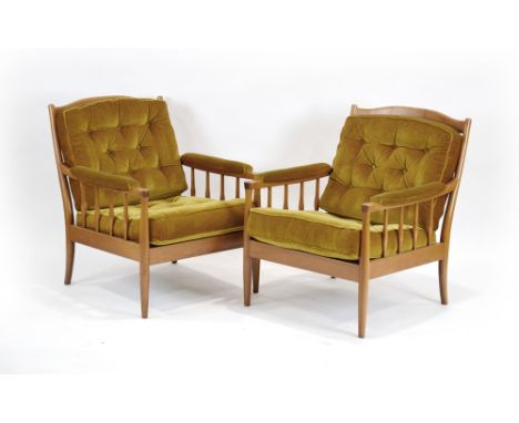 A pair of 1960/70's Swedish armchairs with beech frames and mustard button upholstery*Sold subject to our soft furnishings po