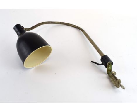 A Bauhaus-era black plastic desk-clamped lamp with a flexible shaft, the clamp stamped  DBGM CONDITION REPORT: Working order 