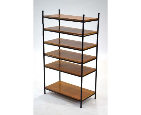 A 1960's British metal tubular shelving system with teak tiers, h. 102 cm CONDITION REPORT: Shelf w. 59 cm, d. 30 cm. Structu