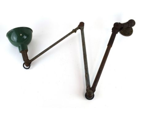 A 1930/40's Dugdills of Stockport industrial wall-mounted three-arm machinist's lamp with a green enamelled shade 