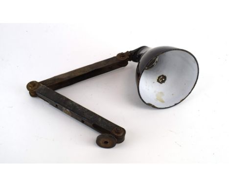 A mid-century black enamelled two-arm adjustable lamp CONDITION REPORT: Dents and wear. Working order unknown.