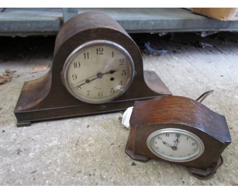 A napoleon hat mantel clock and an oak electric clock