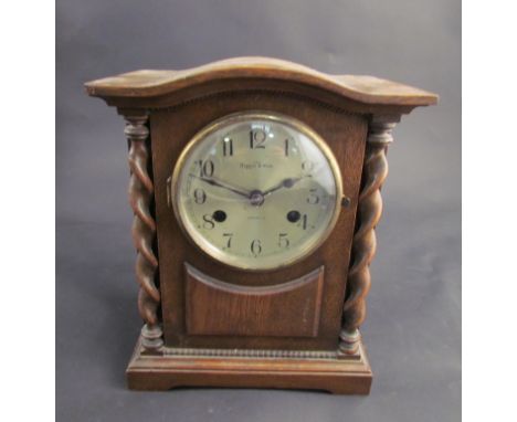 A Mappin and Webb oak cased mantel clock, silvered Arabic dial, 8 day movement