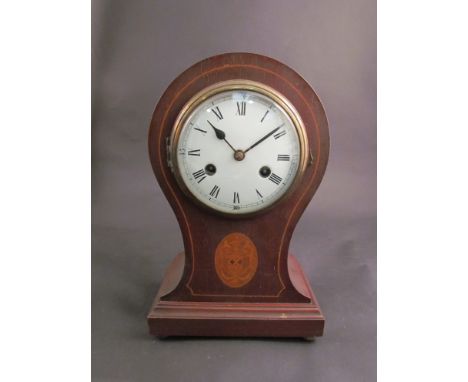 An Edwardian mahogany and inlaid balloon form mantel clock, Roman numerated dial, 8-day movement
