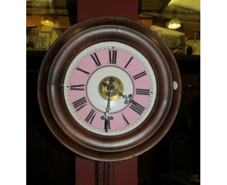 A Victorian postman's alarm clock, Roman numerated dial with weight and pendulum 