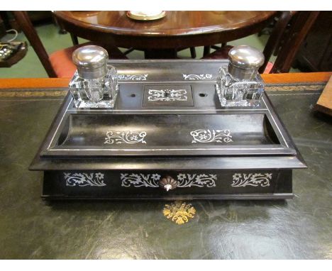 An ebonised and mother of pearl inlay inkstand 