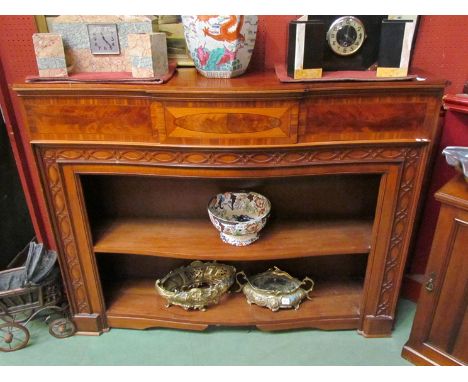 An Edwardian inlaid mahogany bookcase in the form of a fire surround