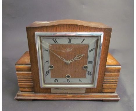 An oak cased mantel clock, Smiths Enfield, with presentation plaque, three train 8 day movement