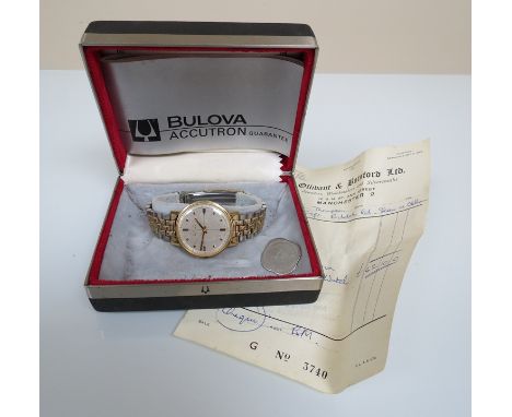 A gent's Bulova Accutron watch with gate link bracelet, boxed with original receipt