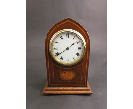 An oak and inlaid lancet form mantel clock, Roman numerated dial