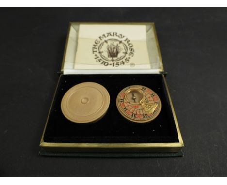 A commemorative sun dial and compass found on The Mary Rose 1510-1545, cased
