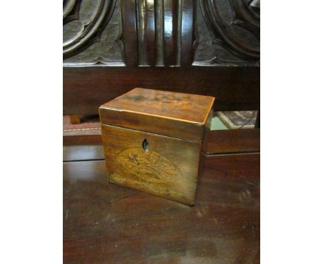 A circa 1830 Georgian inlaid mahogany tea caddy with foliate detail