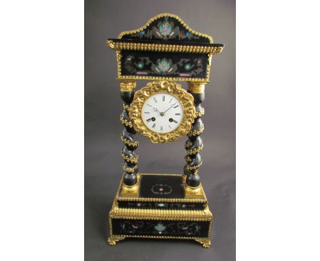 A 19th Century ebonised and ormolu portico form mantel clock, Roman numerated dial with 8 day movement, gilt bezel, twisted s