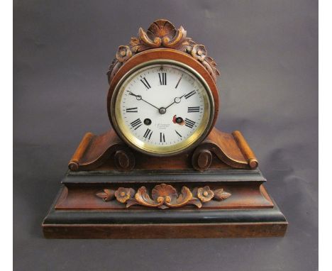 A Victorian walnut and ebonised mantel clock, Roman numerated dial a/f, signed J.W. Benson, Ludgate Hill, London, key and pen