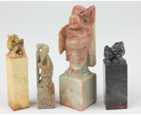 MODERN JADE, ETC. CHOPS AND FIGRESGroup of four carved stone "chops", or stamps, each between 3" and 4 1/2" tall, with two de