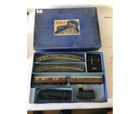Included is a Hornby dublo electric train set, with sir Nigel Gresley engine and tender as well as coaches and track.
