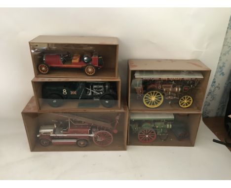 Included is a large collection of model cars, 5 of which are 1:18th scale, and include a fire engine and a Bentley. Also incl