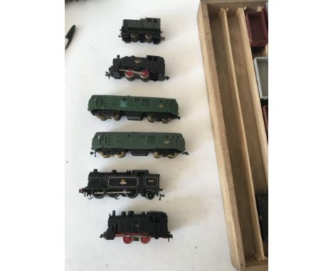 3 trays of of train items including, 6 engines one of which is a Hornby 69567 3 rail engine, as well as numerous coaches and 
