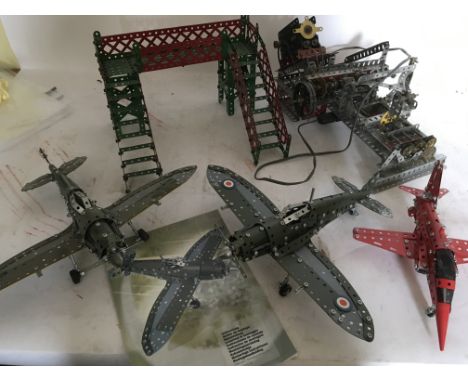 A collection of Meccano models including Red Arrow, Aircraft etc