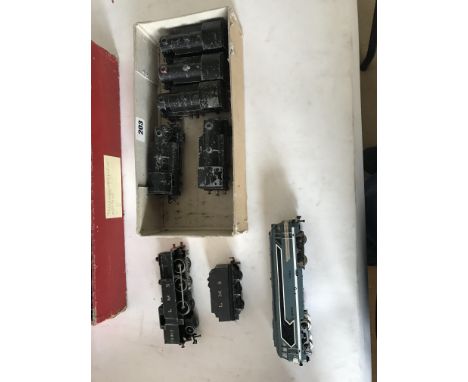 Collection of 3 boxes of train items. The first box contains 5 trix engines, 1 Hornby Lms 6917 3 rail engine and tender, as w