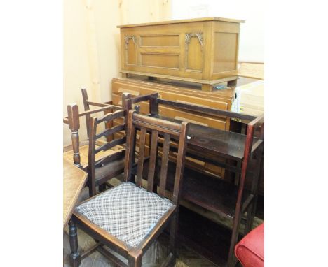 A set of folding shelves, an Oak trunk and three dining chairs
