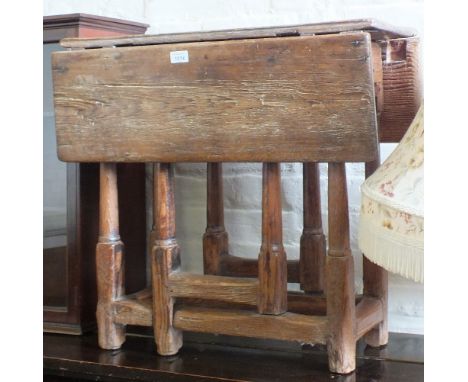 An 18th Century rustic Pine rectangular gate leg table