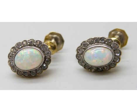 A pair of 9ct gold screw back opal cluster earrings with zircon halos, 2.6g, 1.1cm