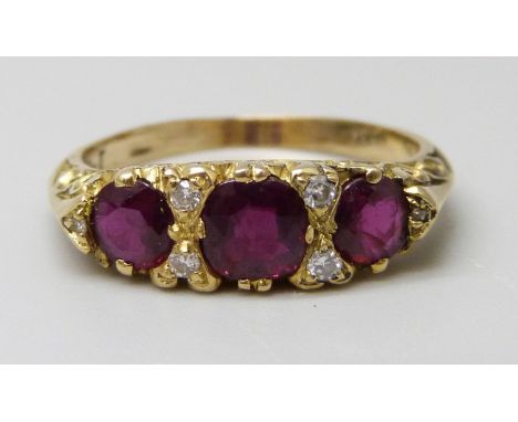 An 18ct gold, ruby and diamond ring, 4g, N
