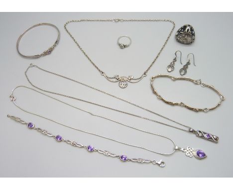 A collection of Rennie Mackintosh style silver jewellery - two bracelets, a bangle, two pendants on chains, a necklace, a sca