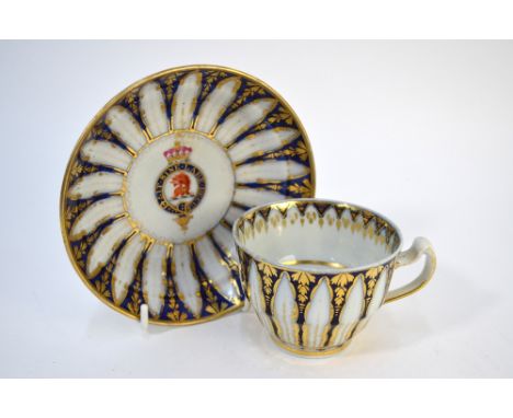 An armorial porcelain cup and saucer from Lord Eldon's service, c. 1800, probably Chamberlains Worcester, the saucer bearing 