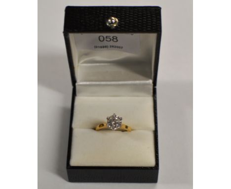 DIAMOND SOLITAIRE RING SET ON 18 CARAT GOLD BAND IN PLATINUM MOUNT - APPROXIMATELY 1 CARAT     