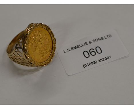 9 CARAT GOLD RING SET WITH A FULL 1974 SOVEREIGN - APPROXIMATE WEIGHT = 13.8 GRAMS     