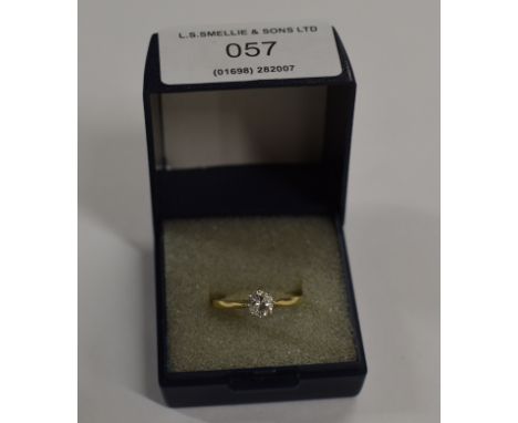 DIAMOND SOLITAIRE RING SET ON 18 CARAT GOLD BAND - APPROXIMATELY 0.5 CARATS     