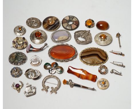 A small collection of mainly silver, sterling and white metal jewellery including Celtic brooches, Iona ship brooch, a Scotti