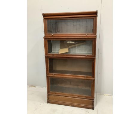 A walnut Globe Wernicke style four section bookcase, width 86cm, depth 29cm, height 160cm