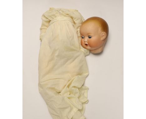 An Armande Marseille bisque head doll with open/close eyes, numbered 518 (a.f)