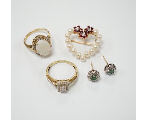 Two yellow metal and gem set rings, including diamond chip cluster and white opal and diamond chip cluster, together with a y