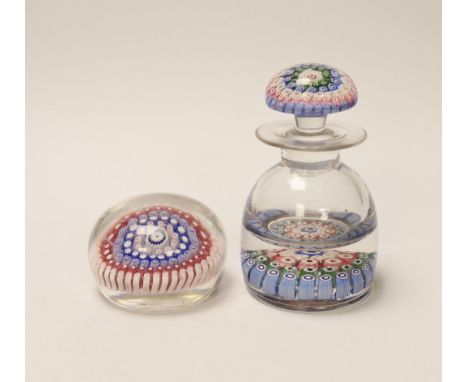 A millefiori glass inkwell and a paperweight, 14cm high Inkwell one tiny nick at broadest part of base, not easily seen; stop