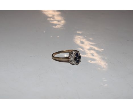 A 9ct gold sapphire and diamond set cluster ring, ring size O, approx. total weight 1.8gms 