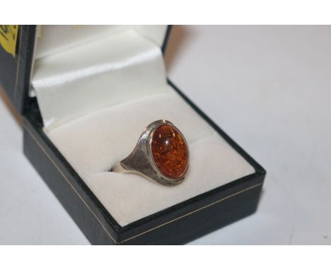 A Sterling silver and amber ring, size T/U