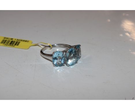 A 925 silver aquamarine coloured three stone ring, ring size N, approx. 3.5gms 