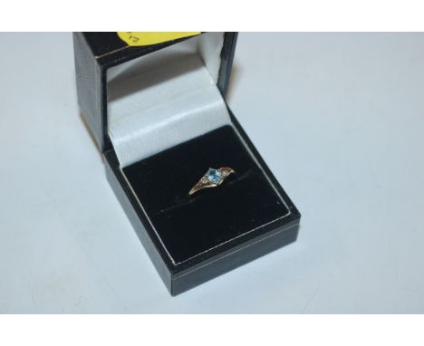 A 9ct gold blue spinel and diamond ring, size N/O