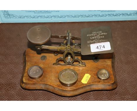A set of vintage postal scales and weights 