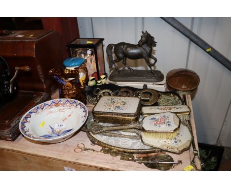 An Imari bowl with bird decoration; a copper lustre jug; various horse brasses, an embroidered dressing table set; a copper c