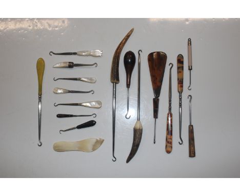 A selection of mother of pearl, bone handled and other button hooks