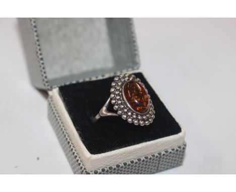 A vintage Sterling silver and amber ring, size P/Q