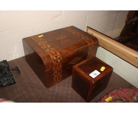 A 19th Century mahogany and satinwood cross banded tea caddy; and a Victorian walnut and inlaid sewing  box 