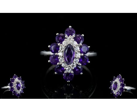 Amethyst and White Zircon Cluster Ring, a marquise cut amethyst framed with a row of round cut natural white zircon, then a f