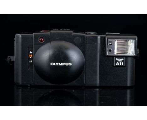 Olympus XA2 Range Finder 35 mm Compact Film Camera with Detachable Flash. Produced 1980 - 1986, Features Lens D Zuiko 35 mm, 